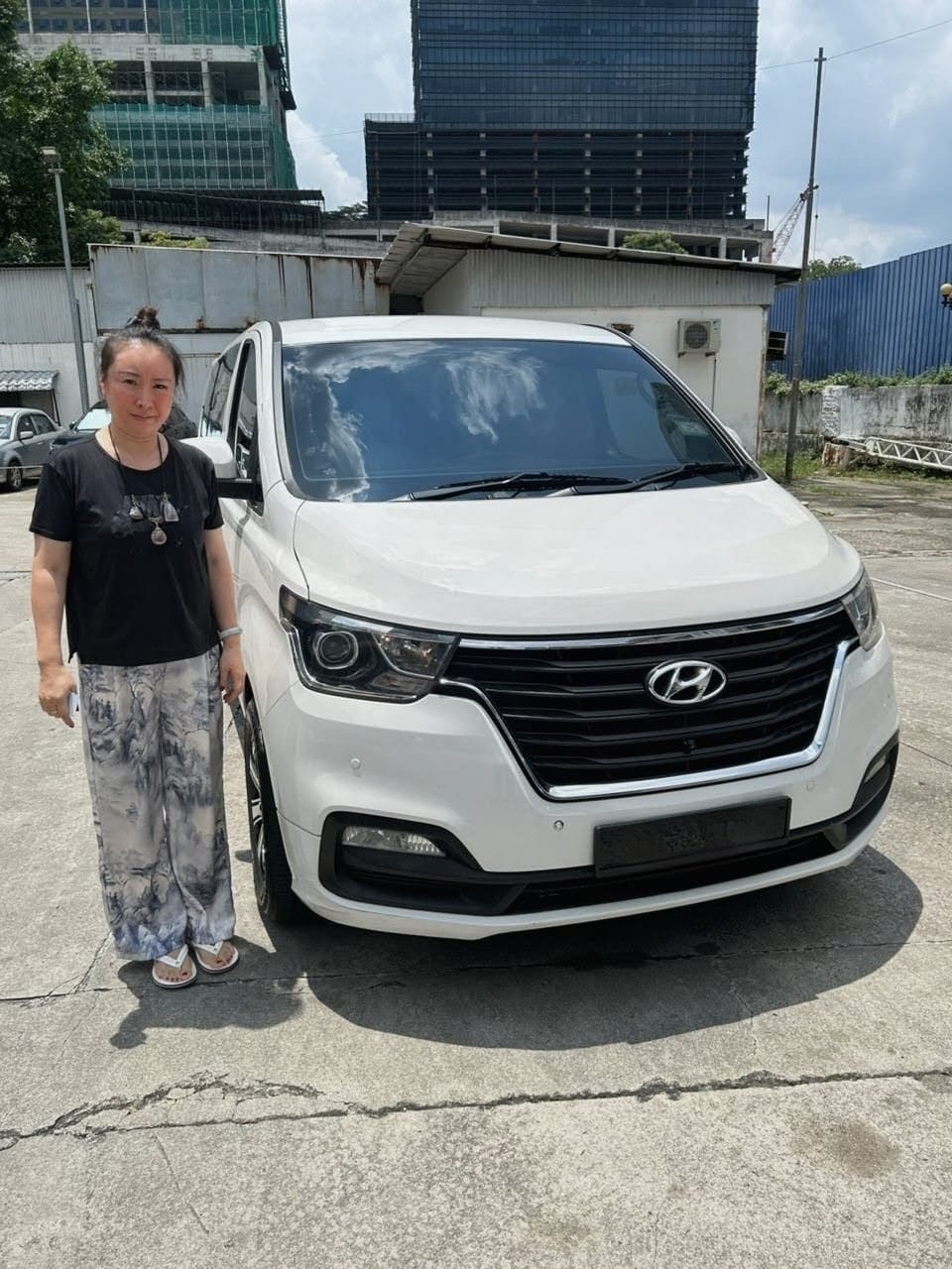 Al-Rizqi verified customer collecting their rental
